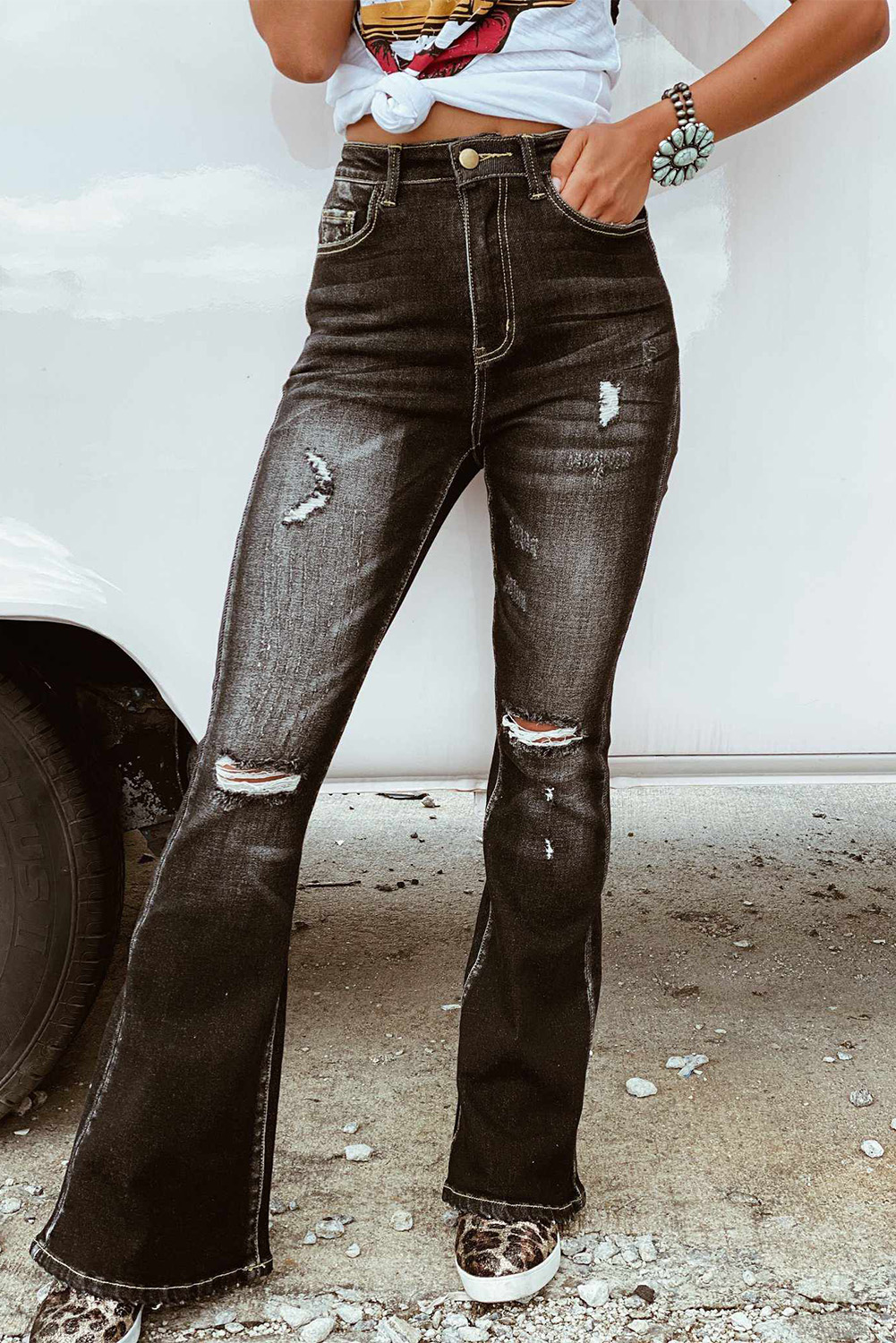 black ripped flare jeans